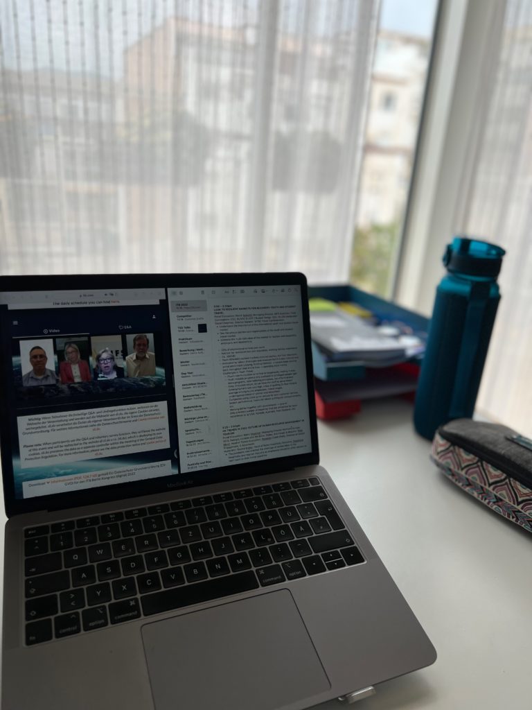 Pia-mingenbach-professional-career-marketing-latest-activities-ITB-Convention-Berlin-2022-online-attendance-talk-notes- laptop